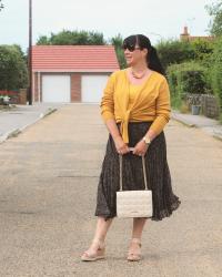 Pleated Skirt with Mustard Accents and Lotus Shoes Wedges.