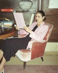 Sitting in a Pink Blazer