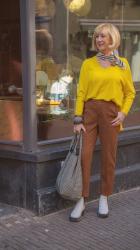 Cognac coloured trousers with a yellow Kenzo jumper