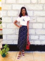 How To Wear A Midi Skirt With A Graphics T-Shirt