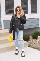 Oversized Moto Jacket with White Doc Boots + Yellow Teddy Blake Bag.