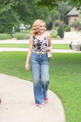 Retro Vibes in High-Waisted Jeans and a Cami