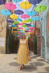 Yellow and White Dress in Umbrella Alley