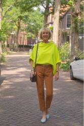 Neon yellow top with cognac coloured trousers