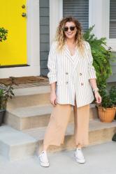 White Pinstripe Blazer and Platform Converse Sneakers.