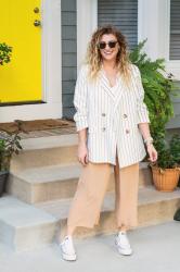 White Pinstripe Blazer and Platform Converse Sneakers.