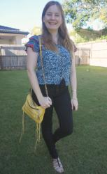 Printed Tops and Black Skinny Jeans With Yellow Bag