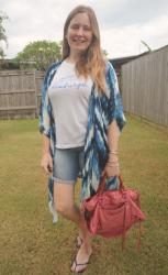 Blue and White Shorts Outfits With Balenciaga Moto Bags