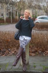 Patterned trousers and burgundy boots