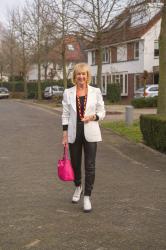 Leather trousers with a white blazer