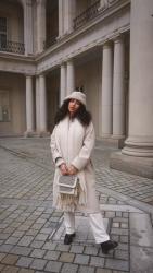 All White Winter Look with a Fluffy Bucket Hat