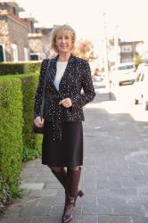 Black and white blazer with a black skirt