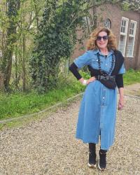 Denim dress with leather trousers