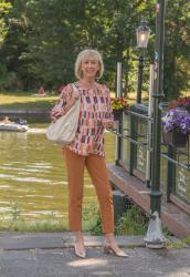 Multi coloured top with cognac coloured trousers and Shopping Saturday