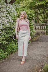 A White Denim Midi Skirt And Pink Baby Tee