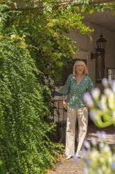 Pebble coloured trousers with a peplum top