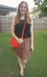 Leopard Print Skirt Outfits With Red Saddle Bag