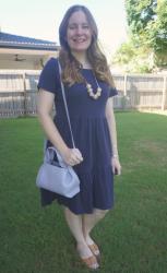 Navy Dresses And Purple Bags