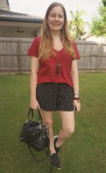 Red Tees, Printed Shorts And Cupid Bag