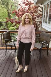 Spring Style: Embrace Elegance with a Pink Wrap Top and Black Trousers