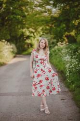 A Red And White Floral Dress Outfit
