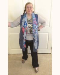 Combining Feminine and Masculine Outfit Elements in a Casual Look for SIA The Lovers