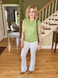 Be Spring Chic in a Green Knit Vest and White Flared Jeans
