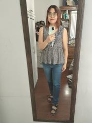Outfit propio: Blusa peplum animal print blanco/negro + jeans azul oscuro.