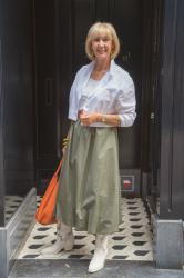 Green balloon skirt with a white jacket