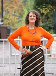 Die Macht schöner Kleidung - Orange tragen