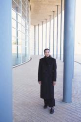 Wearing the black coat I wanted to buy years ago