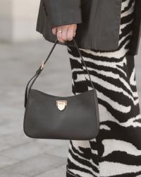 Zebra midi skirt, leather jacket, kitten heels 