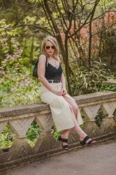 A Cream Denim Maxi Skirt With A Black Lace Top