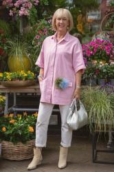 Pink jacket with cream trousers and boots