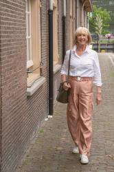 Pink cargo trousers with a white shirt