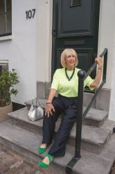 Blue linen trousers with a lime shirt