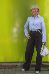Blue and white striped shirt with black jeans